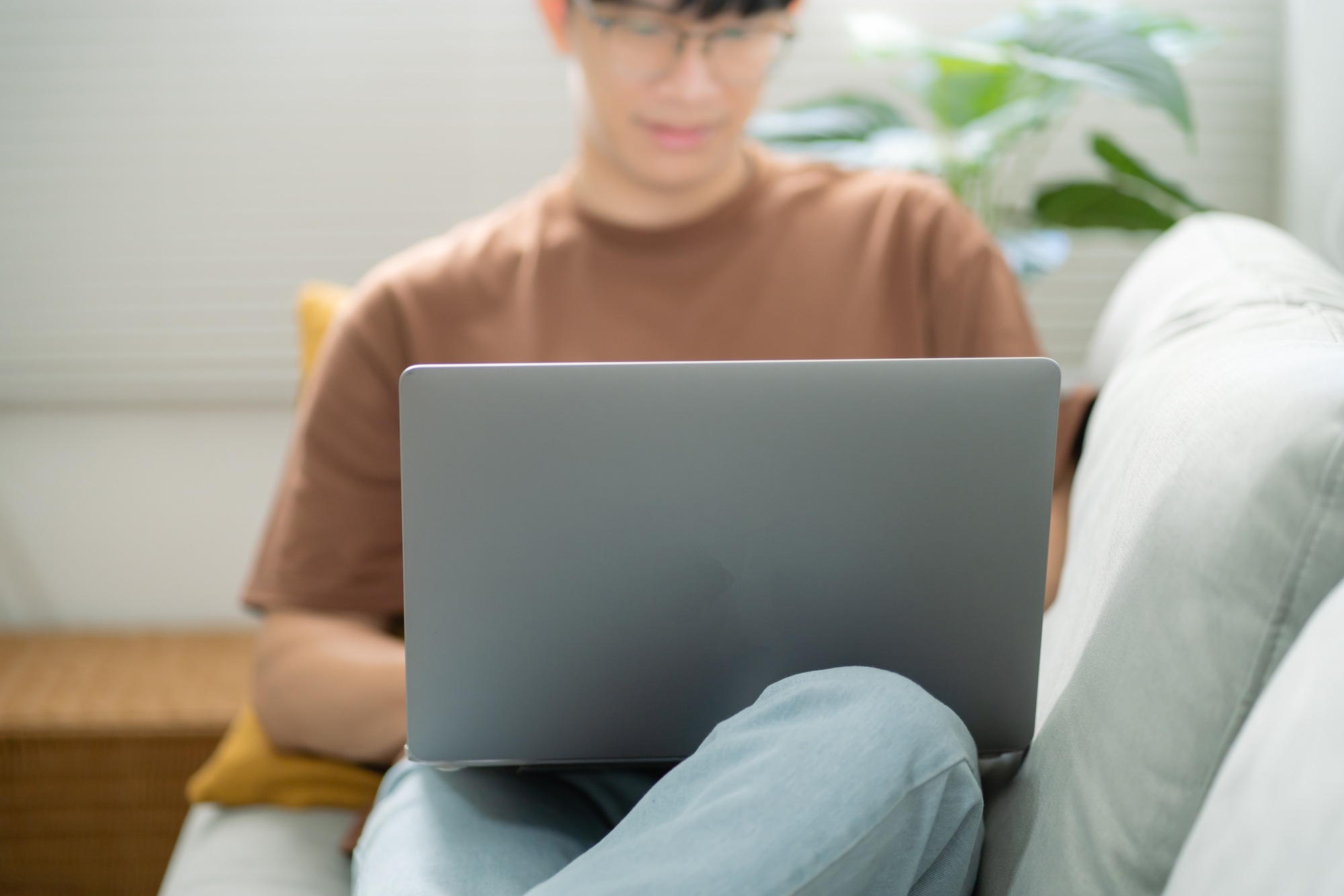 Man work from home. work online on laptop. Asian businessman working online business concept