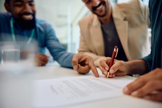 Signing a contract with insurance agent!